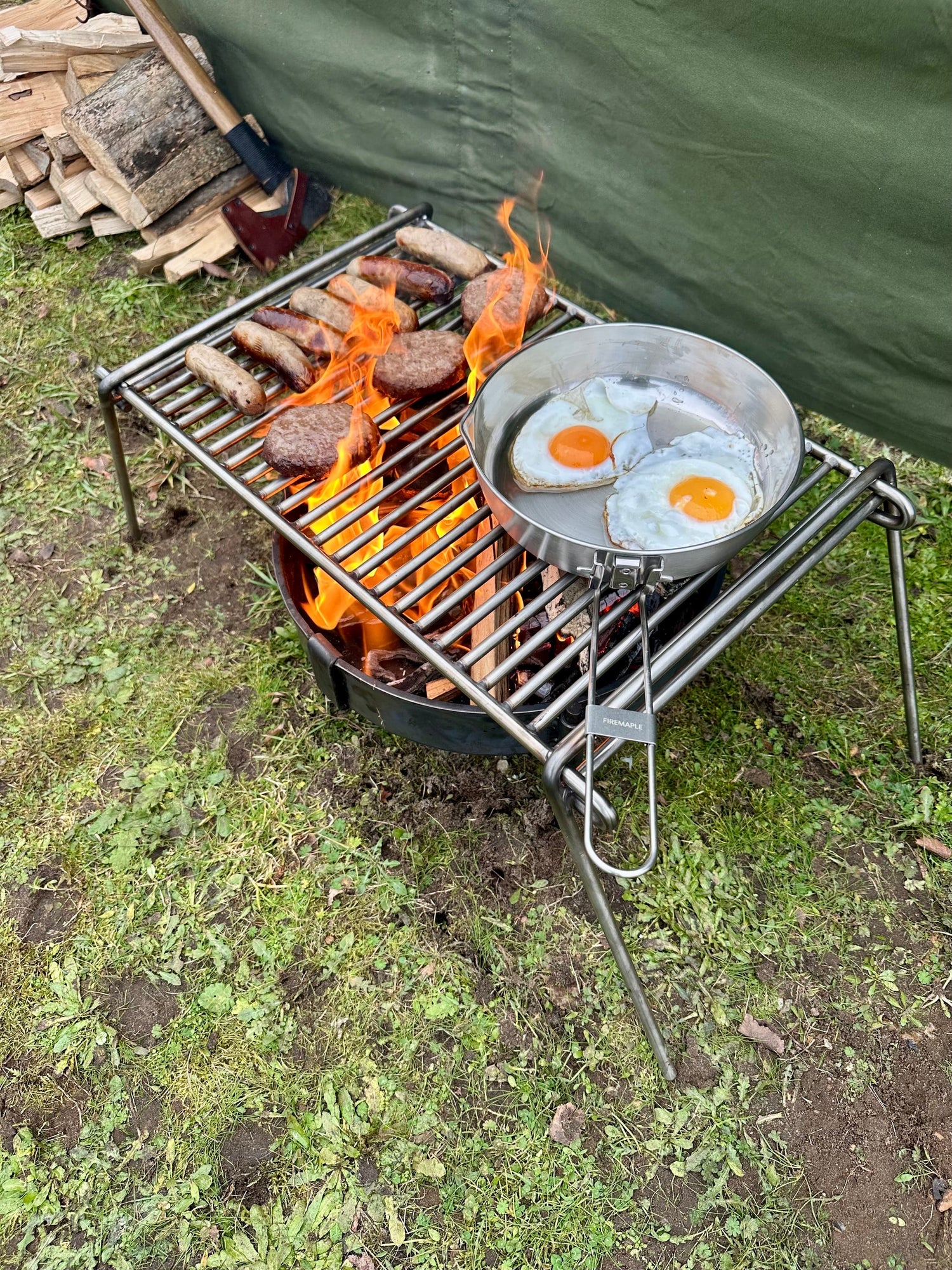Folding Bushcraft and Camping BBQ Grill Can Cook upto 10 plus people. Compact and Portable.